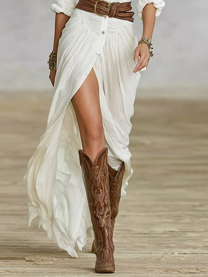 Long belted dress with pleated lapels in cotton and linen