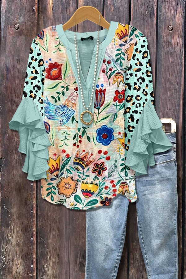 Light blue polka dot blouse with 3D floral print