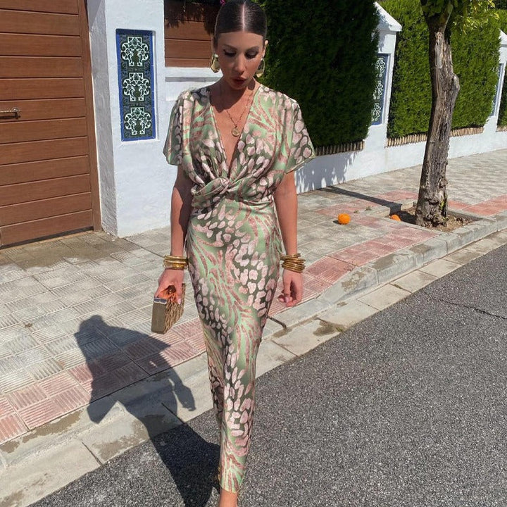 Kelsey - Long dress with V-neck and twisted finish