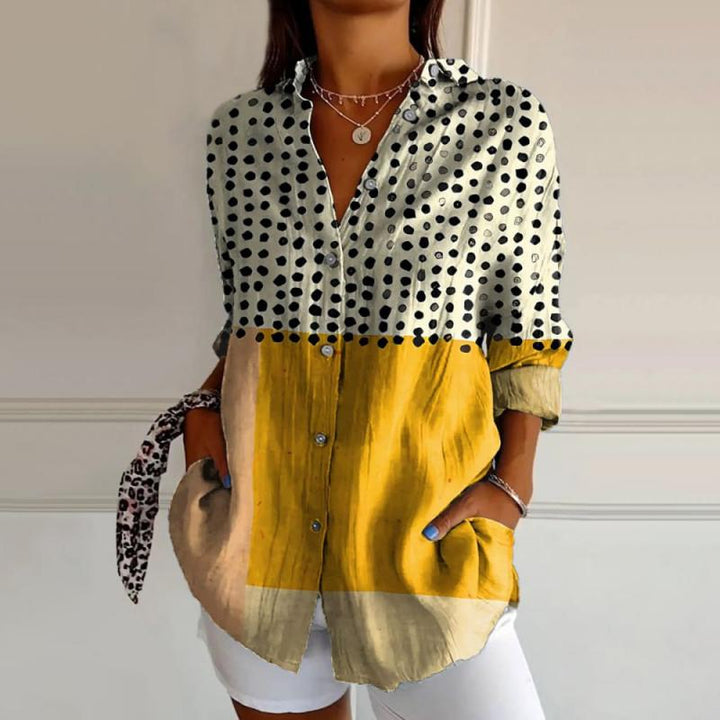 Blouse with color blocks and polka dots